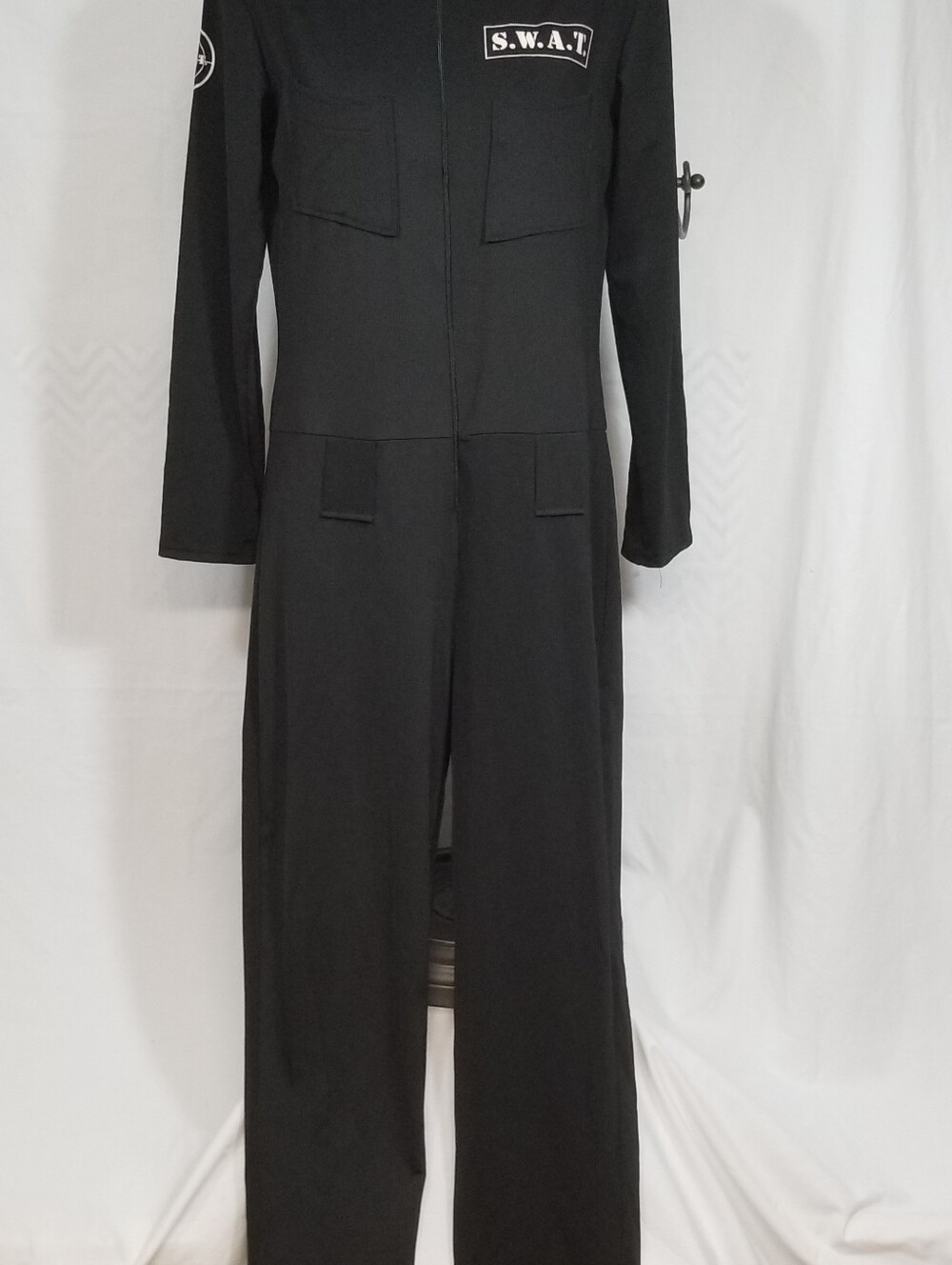 Spirit Halloween black stretch one piece bodycon jumpsuit. Graphic print S.W.A.T